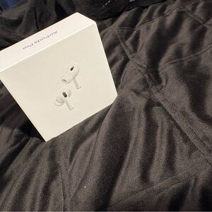 Apple AirPods Pro 2nd Gen with White MagSafe Case